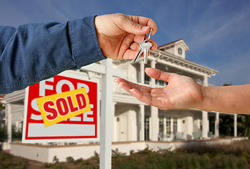 Image showing Handing Over the House Keys in Front of New Home