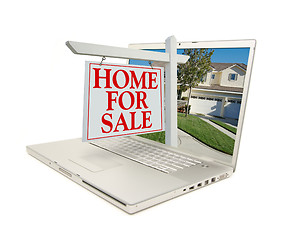 Image showing Home for Sale Sign & New Home on Laptop