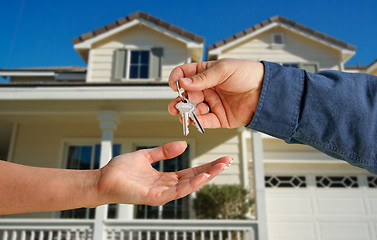 Image showing Handing Over the House Keys in Front of New Home