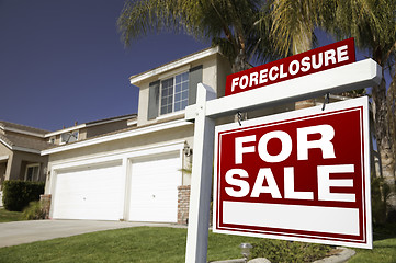 Image showing Foreclosure For Sale Real Estate Sign and House