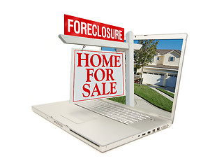 Image showing Foreclosure Home for Sale Sign & Laptop