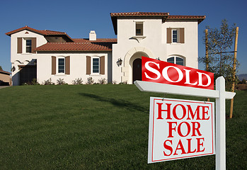 Image showing Sold Home For Sale Sign & New House
