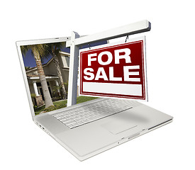 Image showing Home for Sale Sign & New House on Laptop