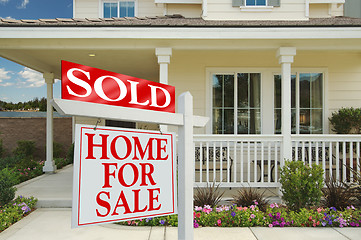 Image showing Sold Home For Sale Sign & New House