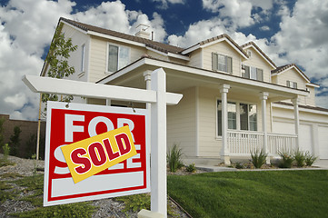 Image showing Sold Home For Sale Sign and House