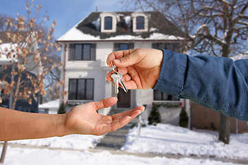 Image showing Handing Over the House Keys in Front of New Home