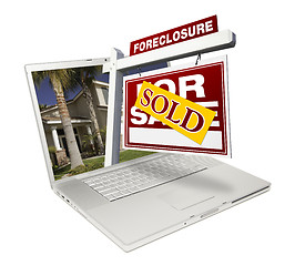 Image showing Sold Foreclosure Home for Sale Real Estate Sign Laptop