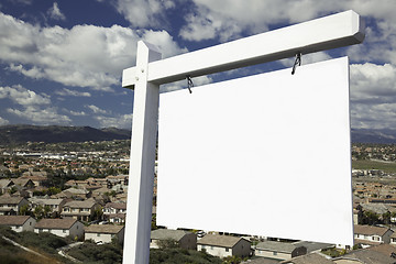 Image showing Blank Real Estate Sign Over Elevated Housing Community View