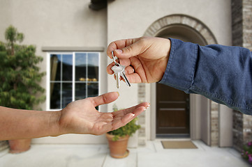 Image showing Handing Over the House Keys in Front of New Home