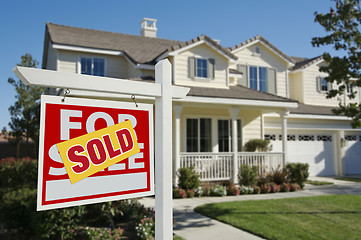 Image showing Sold Home For Sale Sign and House