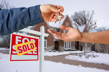 Image showing Handing Over the House Keys in Front of New Home