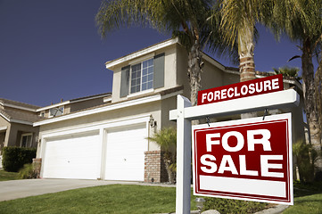 Image showing Red Foreclosure For Sale Real Estate Sign and House