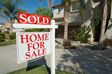 Image showing Sold Home For Sale Sign & New House