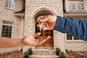 Image showing Handing Over the House Keys in Front of New Home