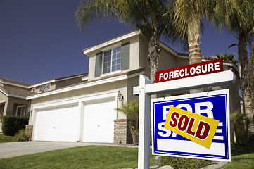 Image showing Blue Foreclosure For Sale Real Estate Sign and House