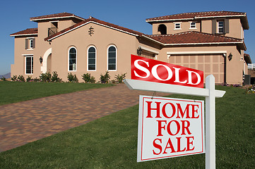 Image showing Sold Home For Sale Sign & New House