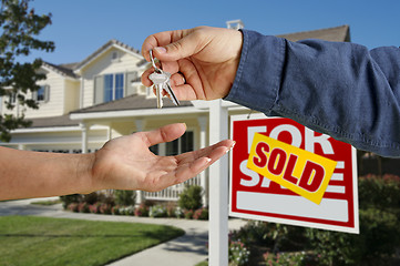 Image showing Handing Over the House Keys in Front of New Home