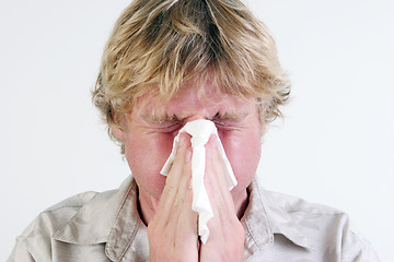 Image showing Man sneezing.