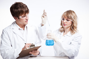 Image showing Working scientists