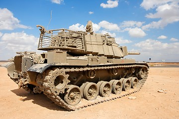 Image showing Old Israeli Magach tank near the military base in the desert 