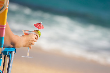 Image showing Woman on Beach with Tropical Drink