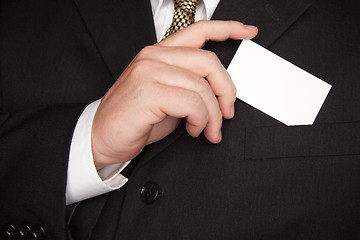 Image showing Businessman Holding Blank Business Card