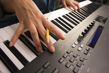 Image showing Woman's Fingers on Digital Piano Keys