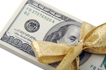 Image showing One Hundred Dollar Bills Wrapped in Gold Ribbon.