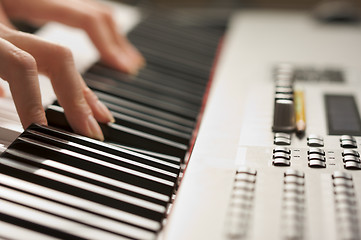 Image showing Woman's Fingers on Digital Piano Keys