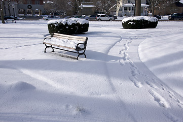 Image showing Empty Snowy Bench