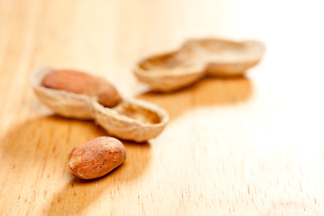 Image showing Peanuts on Wood Background