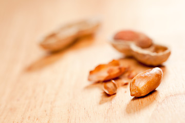 Image showing Peanuts on Wood Background