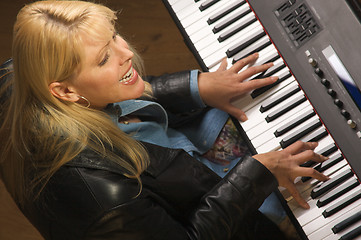 Image showing Female Musician Performs