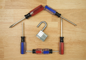 Image showing House Shaped by Screwdrivers and Lock