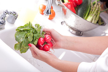 Image showing Woman Washing Radish