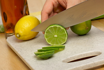 Image showing Slicing a Lime