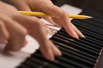 Image showing Woman's Fingers on Digital Piano Keys