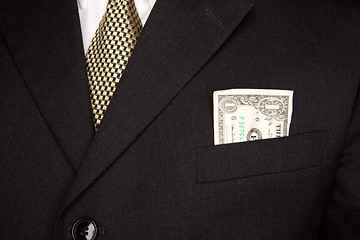 Image showing Dollar Bill in Businessman's Coat Pocket