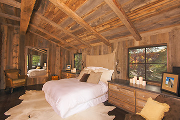 Image showing Luxurious Rustic Log Cabin Bedroom