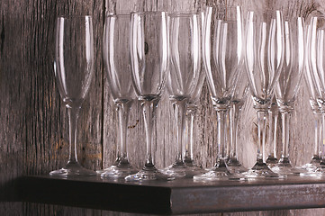 Image showing Champagne Flutes on Shelf