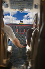 Image showing Jet Cockpit with Pilots and Clouds