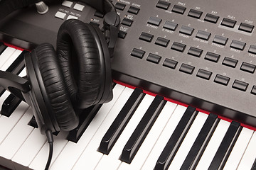 Image showing Headphones Laying on Electronic Keyboard