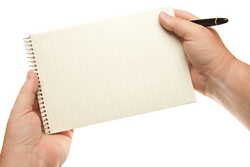Image showing Male Hands Holding Pen and Pad of Paper