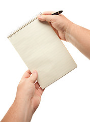 Image showing Male Hands Holding Pen and Pad of Paper