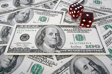 Image showing One Hundred Dollar Bills & Red Dice