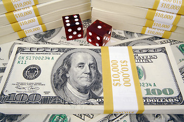 Image showing One Hundred Dollar Bills & Red Dice