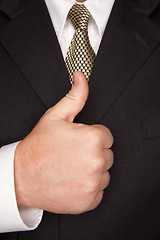 Image showing Businessman Gesturing Thumbs Up with Hand