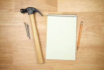 Image showing Pad of Paper, Pencil, Hammer and Nails