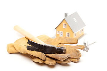 Image showing Hammer, Gloves, Nails and House