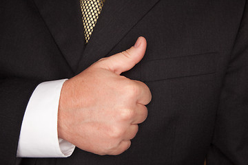 Image showing Businessman Gesturing Thumbs Up with Hand